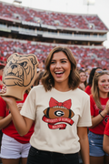 Woman at college football game wearing ivory UGA Bulldogs bow football tee