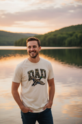 Dad wearing Camo Duck Dad T-Shirt at golden hour near a lake