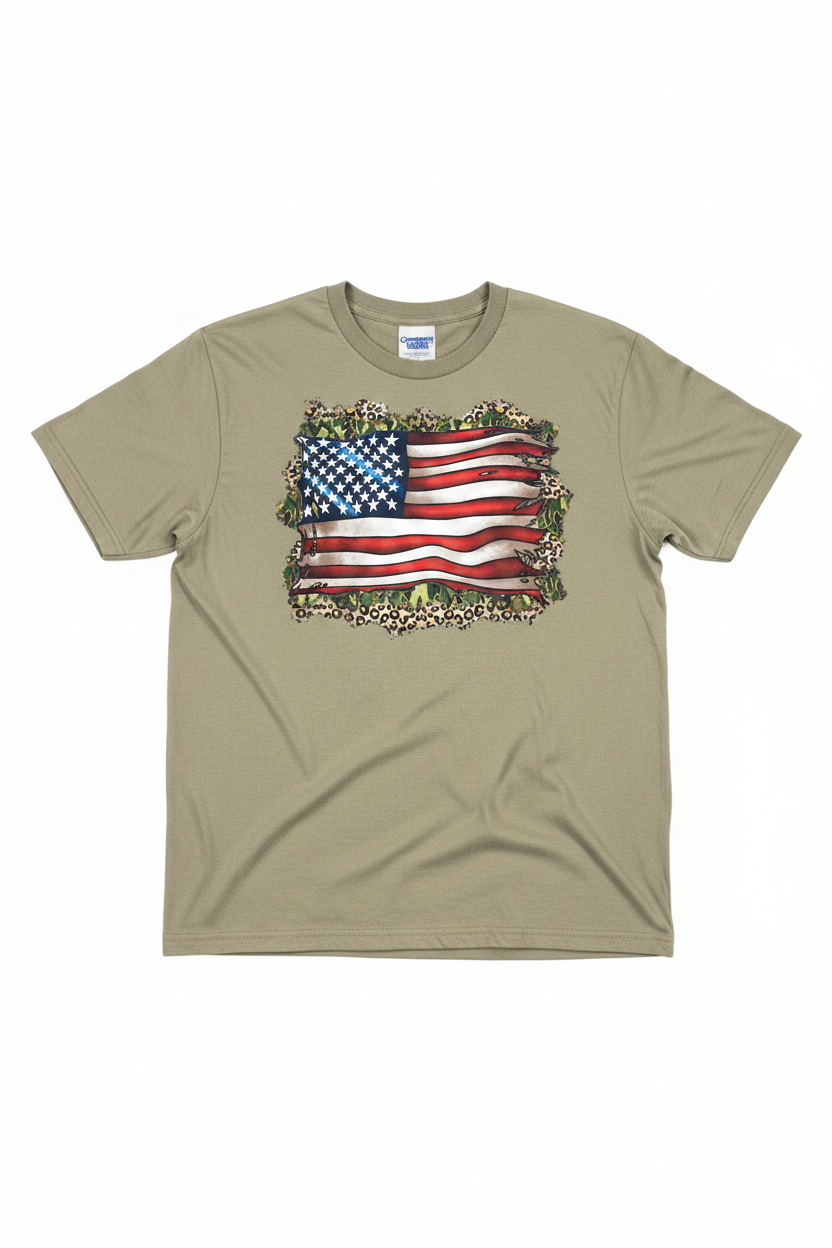 Tattered Flag Camo Leopard T-Shirt flat lay on sand khaki tee
