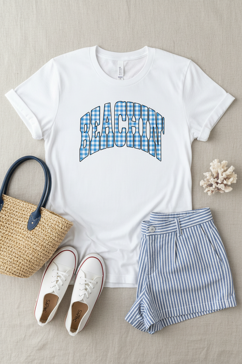 Beachin' gingham collegiate graphic on white t-shirt flat lay
