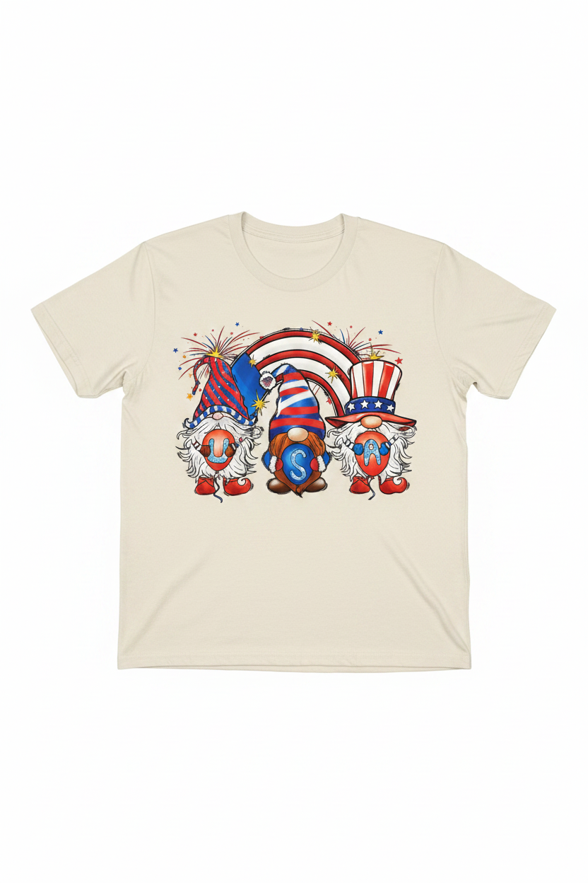 USA Gnome Rainbow T-Shirt flat lay on natural ivory tee showing three patriotic gnomes with rainbow