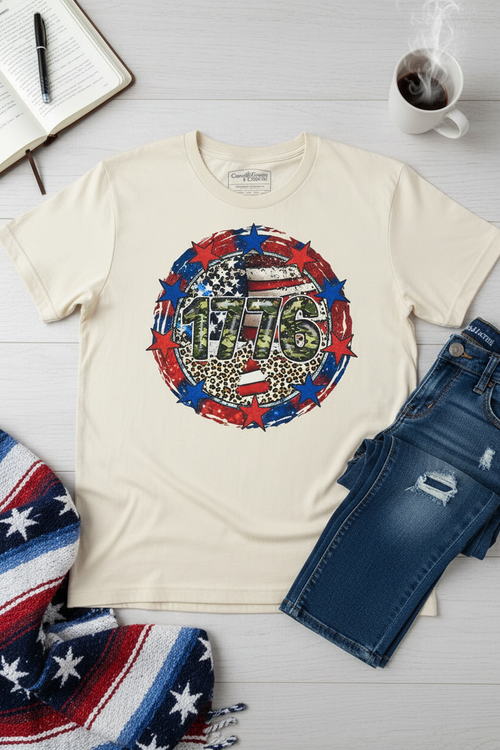1776 Camo Star T-Shirt flat lay on natural ivory tee