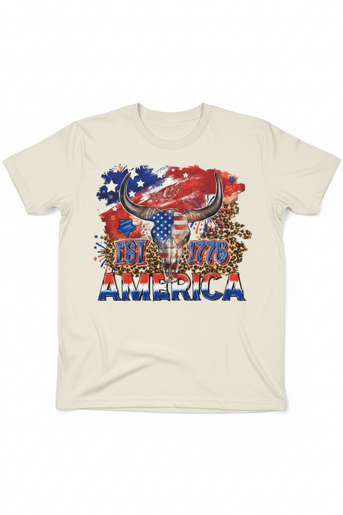America EST 1776 Longhorn T-Shirt flat lay on natural ivory tee