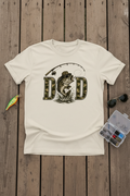 Camo DAD Fishing T-Shirt styled with fishing lures and tackle box on rustic wood dock