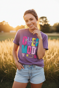 Woman wearing Overthinking Mode On T-Shirt in dusty purple in a fun casual outdoor lifestyle photo