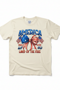 America 1776 Land of the Free T-Shirt flat lay on natural ivory tee showing patriotic bow graphic