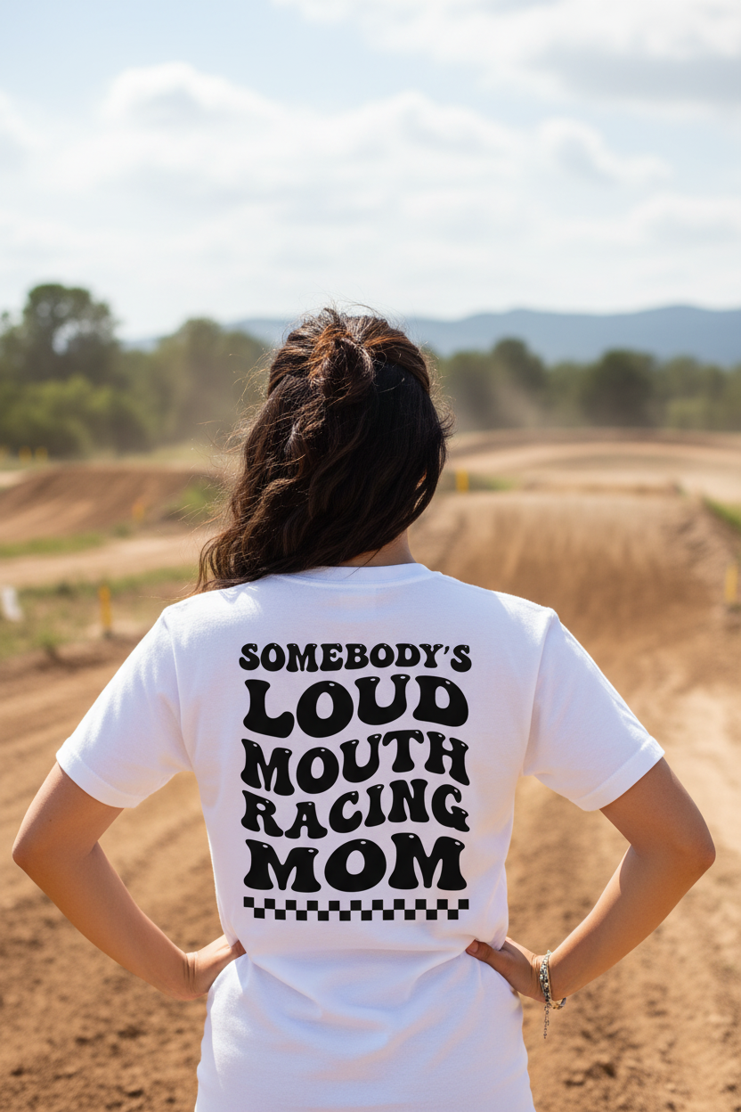 Woman wearing Somebody's Loud Mouth Racing Mom tee - back view at motocross track